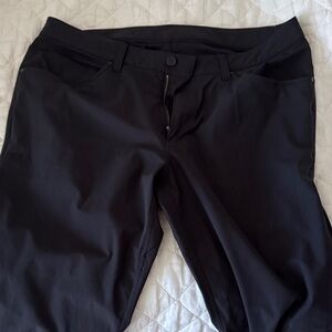 Lulu Lemon ABC - Stylish black pants. 34-30. Tags Removed due to long Lulu tags.